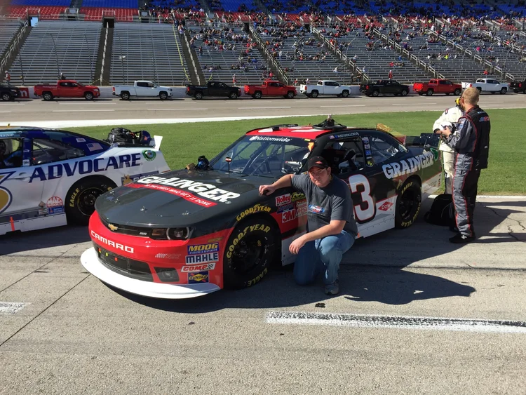 Grainger-branded number 3 Chevrolet Camaro on pit road at a NASCAR racetrack, with Austin Dillon’s name visible above the driver window